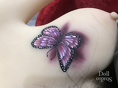 jiusheng-doll-tattoo.jpg